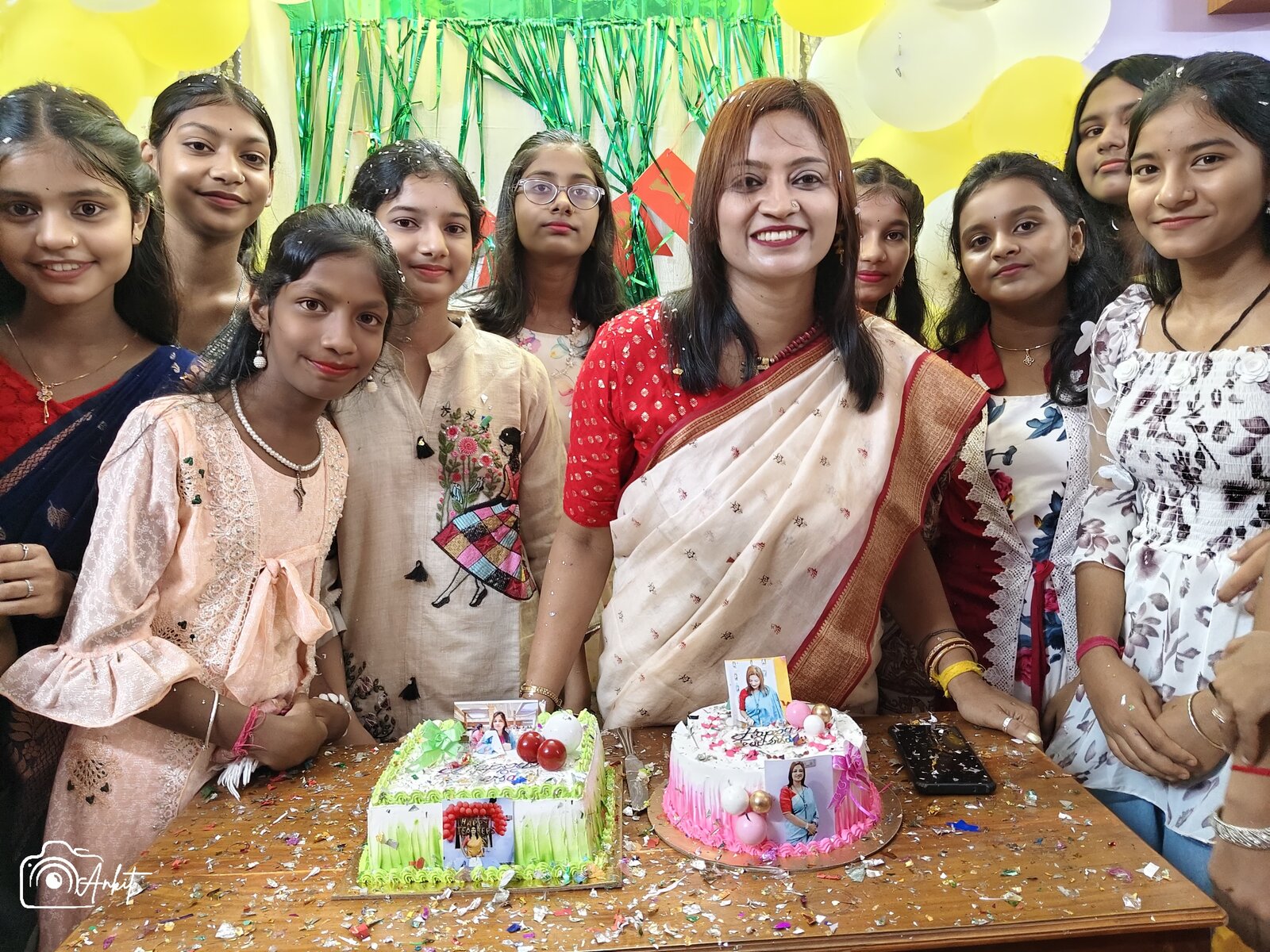 Class 7 cutting the Teachers Day cake with Jolly Miss